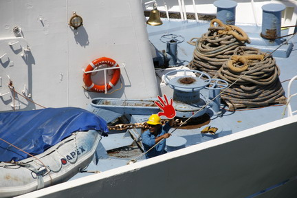 ©2013 The Amusing Muse - 2/14/2013, crewman aboard Windstar Cruises "Wind Star", Colon, Panama